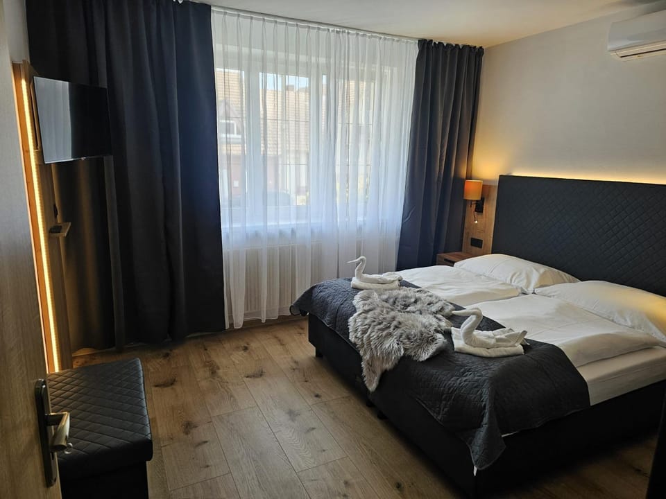 Bed, Photo of the whole room, Bedroom, towels, air conditioner