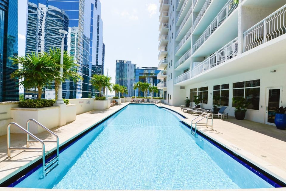 Property building, Swimming pool, sunbed