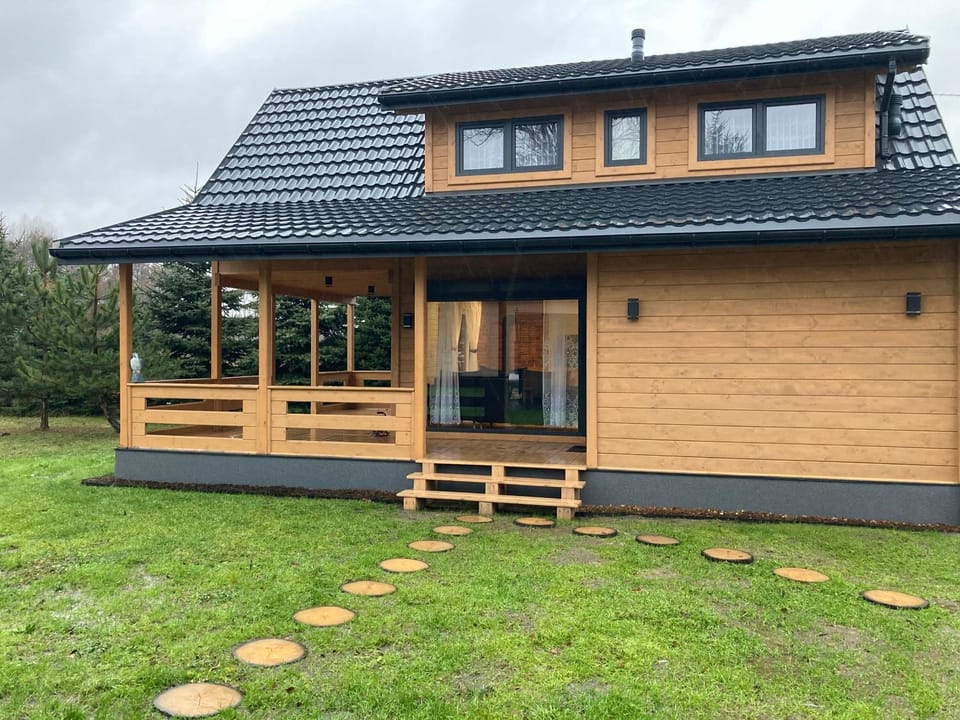 Domek drewniany nad stawem Apartment in Masovian Voivodeship