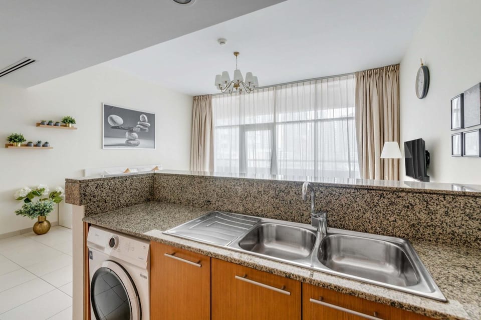 Kitchen or kitchenette, washing machine