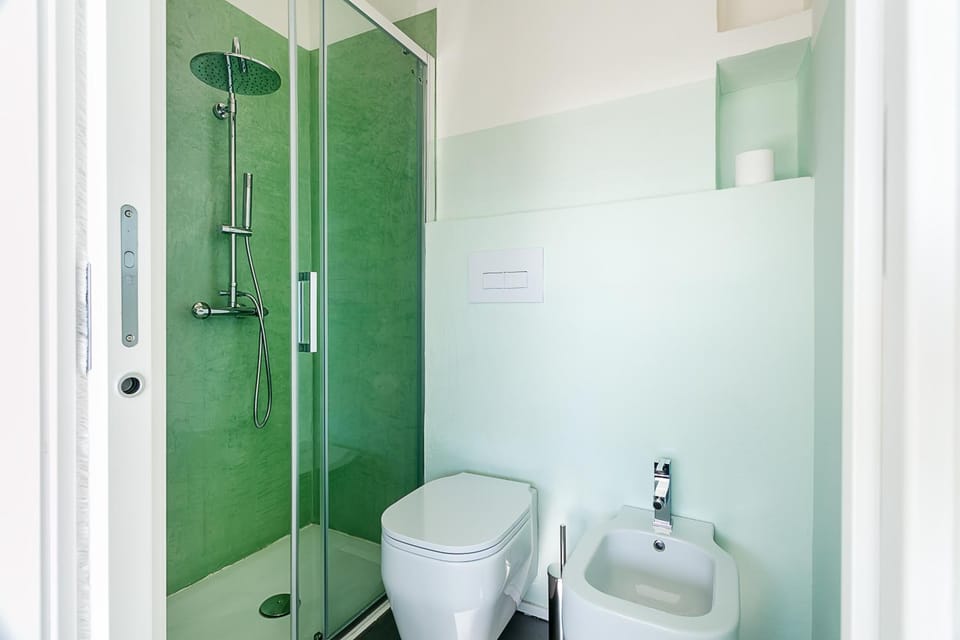 Shower, Toilet, Bathroom, bidet, hair dryier, towels