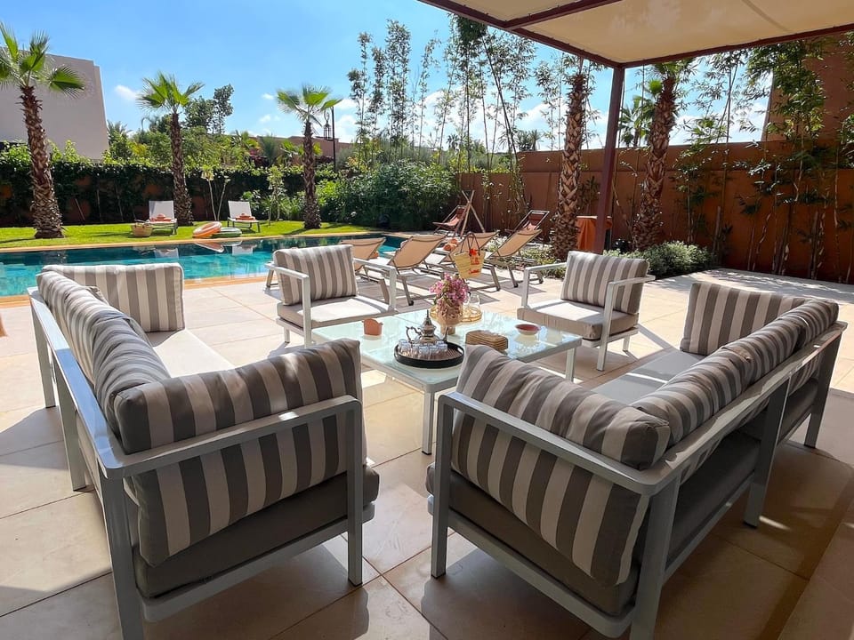 Patio, Day, Garden, Seating area, Garden view, Swimming pool