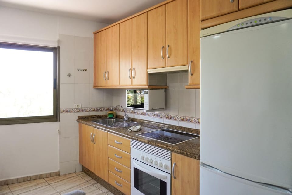 Kitchen or kitchenette, oven, stove, kitchen