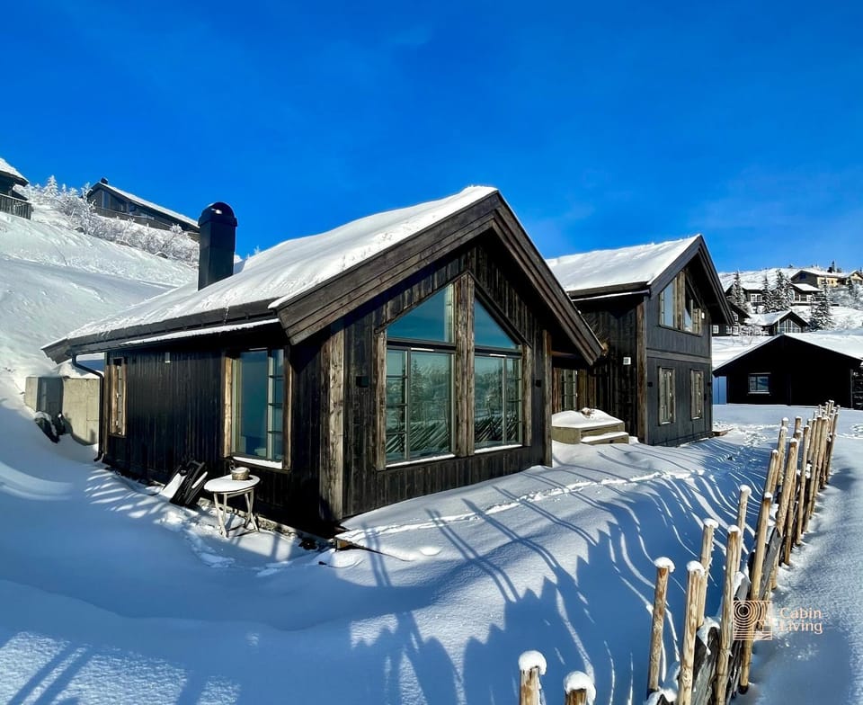 Modern cabin at Høgevarde panoramic view, fireplace and EV station Cabin in Viken, Norway