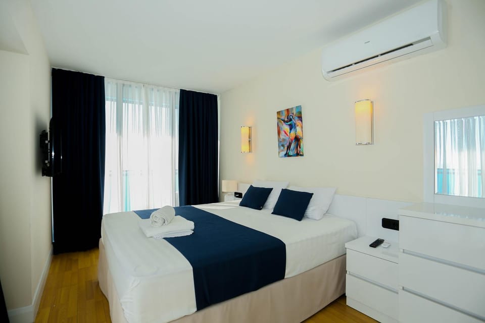 Bed, Bedroom, towels, air conditioner