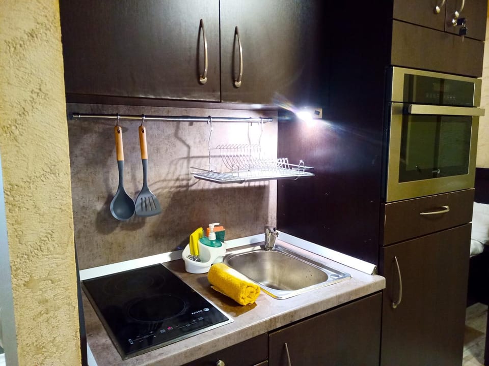 Kitchen or kitchenette, stove