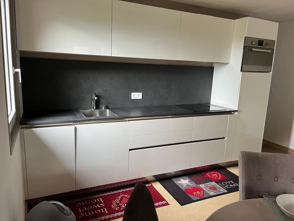 Kitchen or kitchenette, dishwasher, microwave, stove