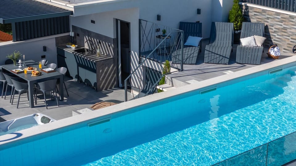 Property building, Seating area, Swimming pool