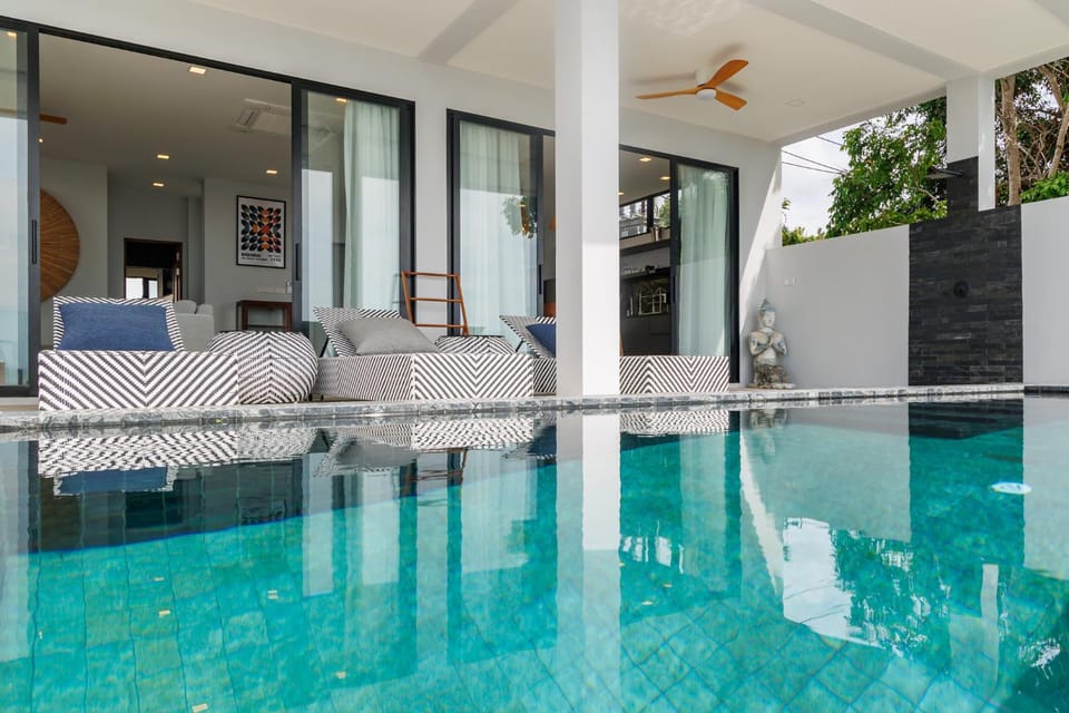 Shower, Patio, Swimming pool, sunbed