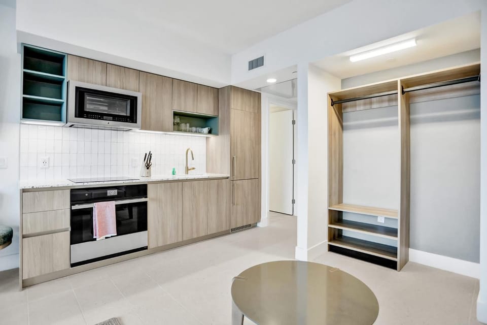 Kitchen or kitchenette, oven, stove, wardrobe