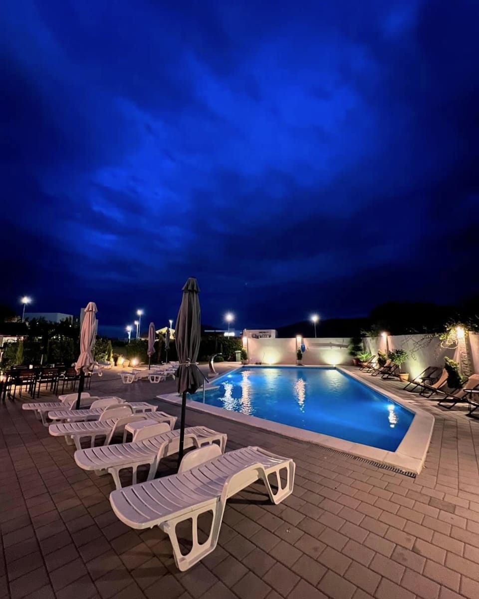 Night, Pool view, Swimming pool, sunbed