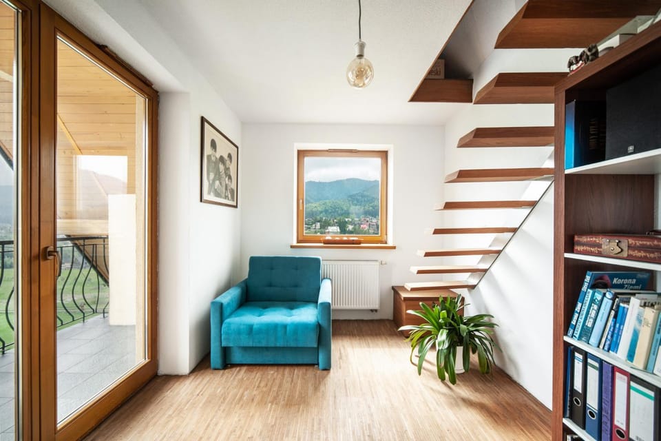 Library, View (from property/room), Balcony/Terrace, Living room, Seating area, Mountain view