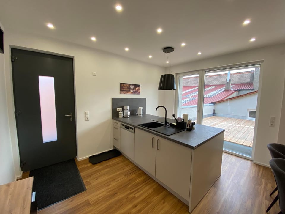 Facade/entrance, kitchen