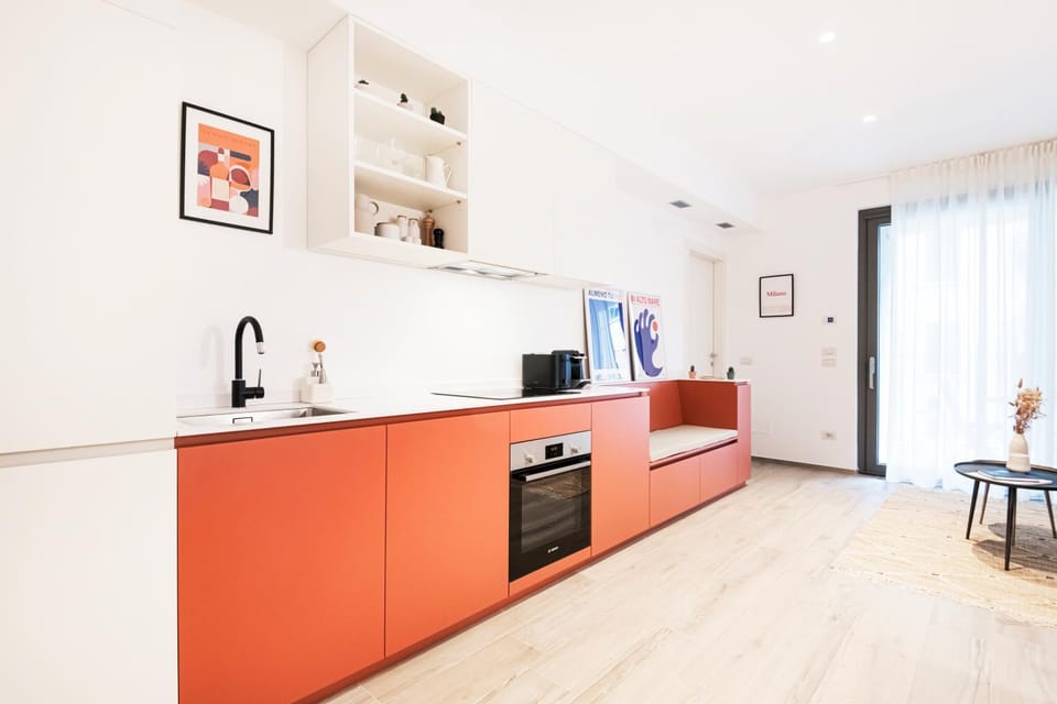 Kitchen or kitchenette, dishwasher, oven, stove