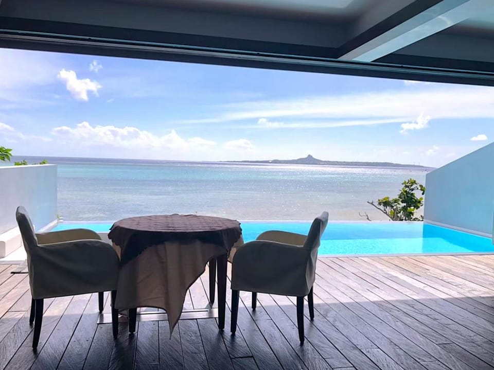 View (from property/room), Living room, Swimming pool