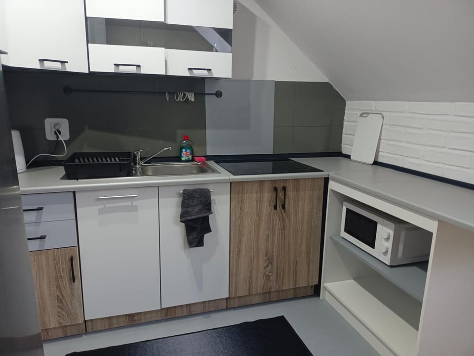 Kitchen or kitchenette, stove