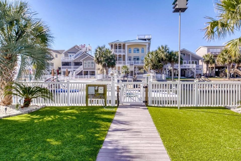 Charming Canal Home with Private Heated Pool and Boat Lift House in Ocean Isle Beach