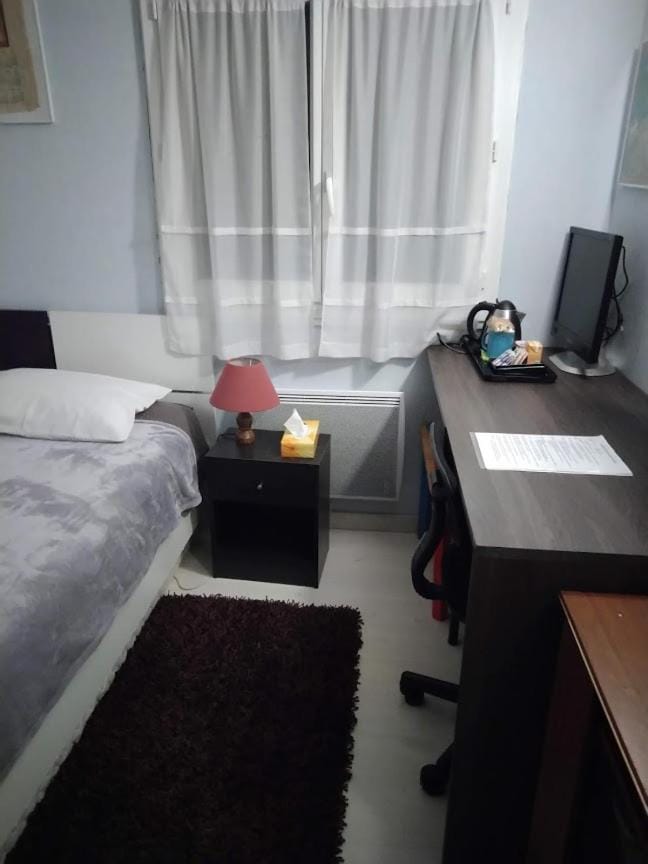Chambre bleue lit individuel Vacation rental in Île-de-France