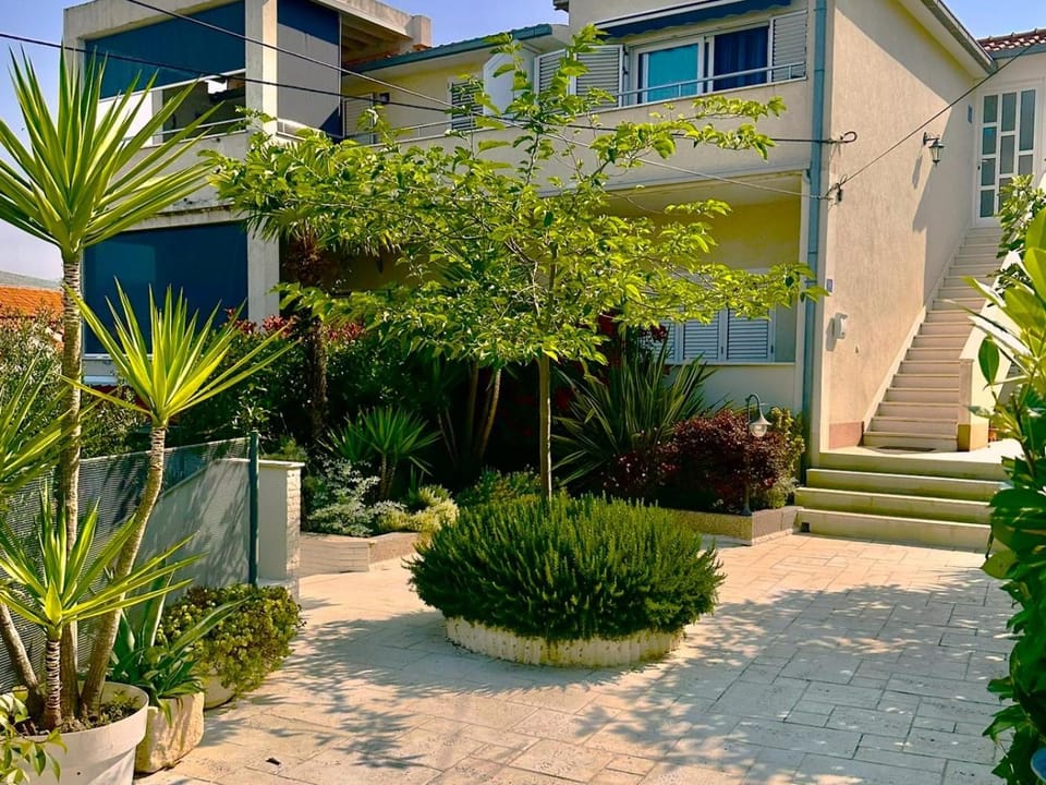 Property building, Patio, Balcony/Terrace, Balcony/Terrace, Text overlay, Inner courtyard view