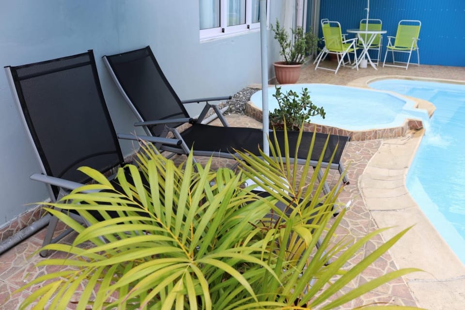 Swimming pool, sunbed
