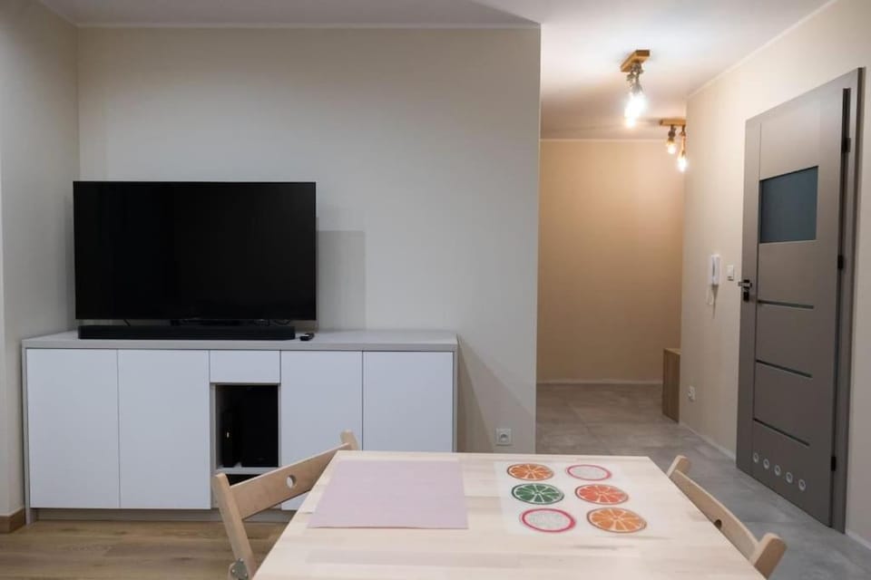 Przestronny apartament w Sosnowcu, miejsce parkingowe w hali garażowej Apartment in Lesser Poland Voivodeship