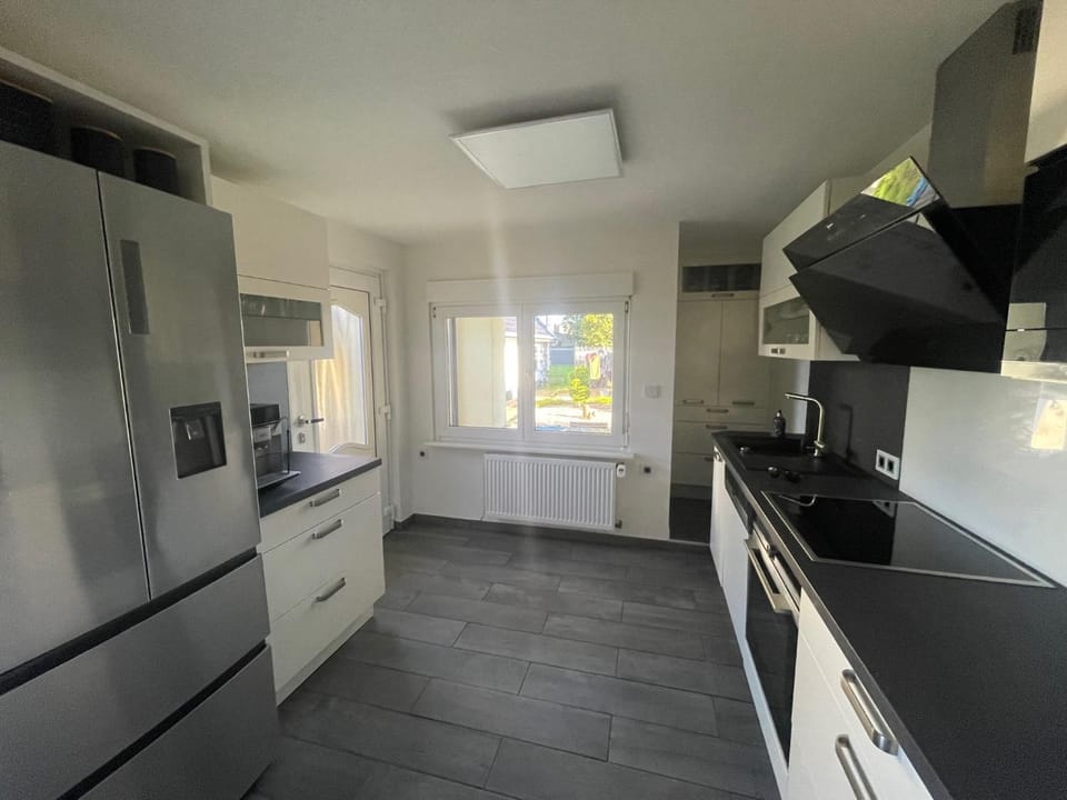 Kitchen or kitchenette, dishwasher, oven, stove, toaster