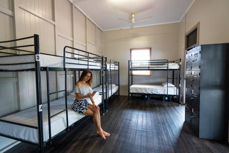 People, bunk bed, air conditioner