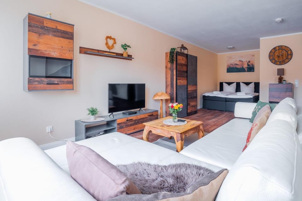 Bed, TV and multimedia, Living room, Seating area