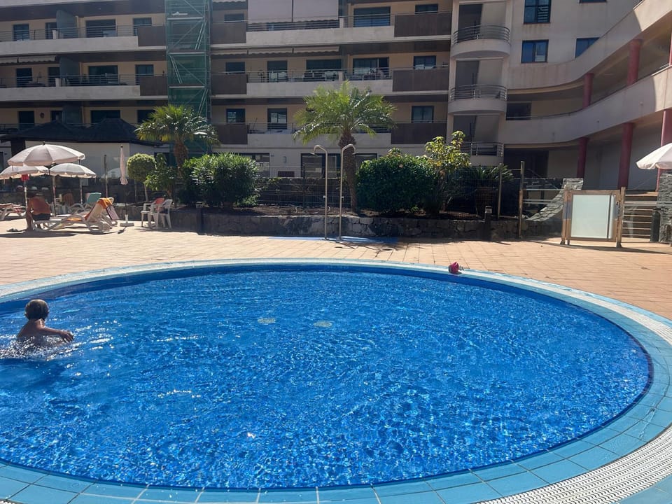 Swimming pool, children, sunbed