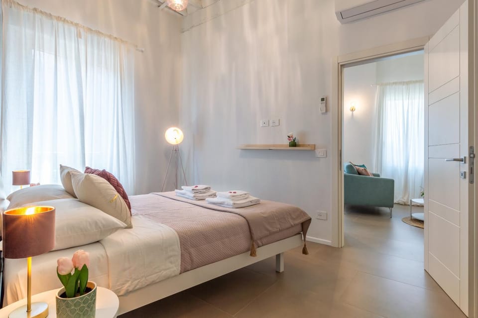 Bed, Photo of the whole room, Bedroom, towels, air conditioner