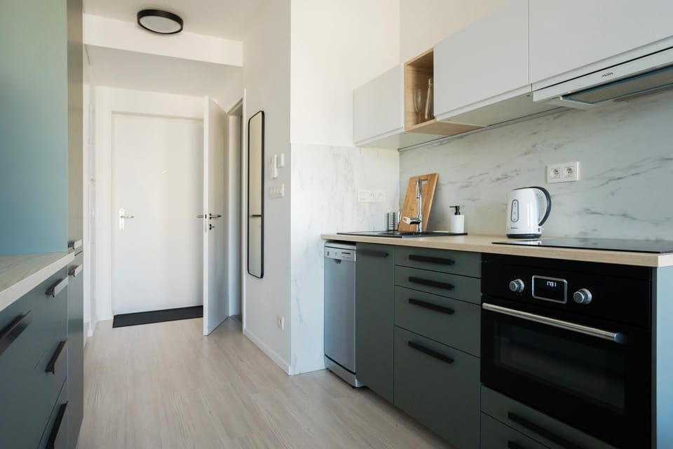 Kitchen or kitchenette, oven, stove