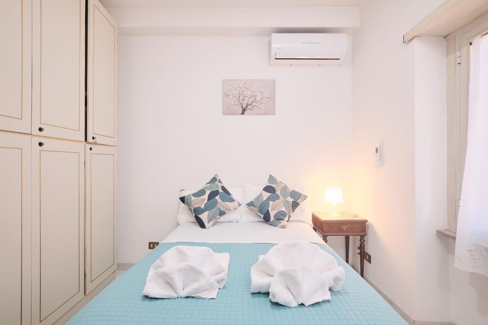 Bed, Photo of the whole room, Bedroom, towels, wardrobe, air conditioner