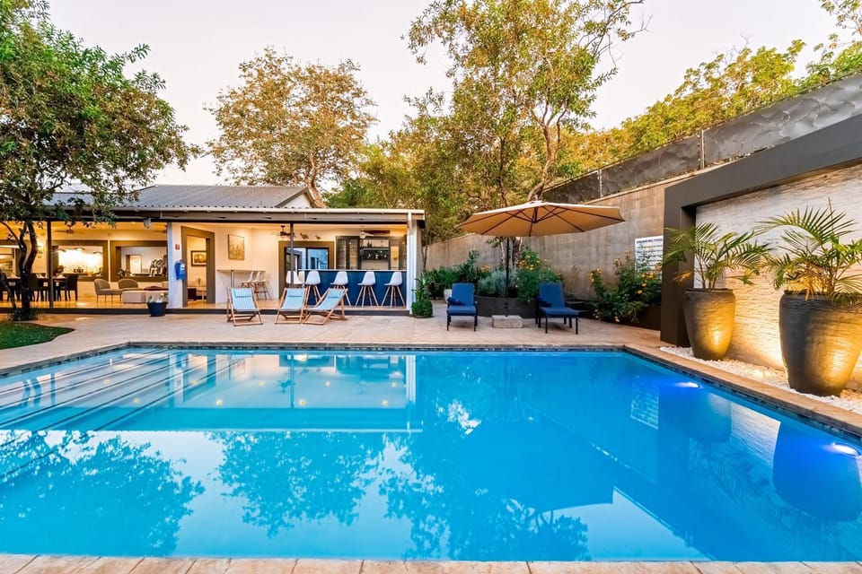Property building, Pool view, Swimming pool, sunbed