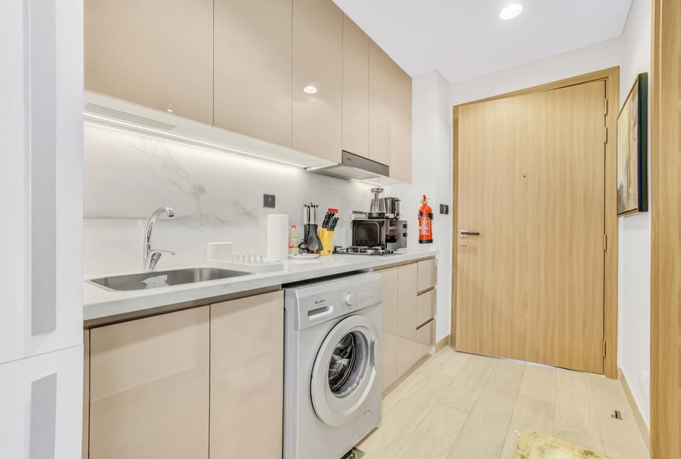 Kitchen or kitchenette, washing machine
