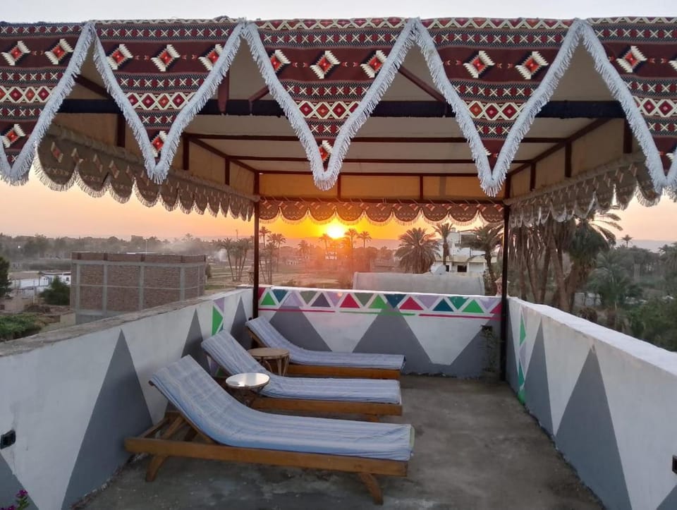 Natural landscape, View (from property/room), Balcony/Terrace, Seating area, Sunset, sunbed