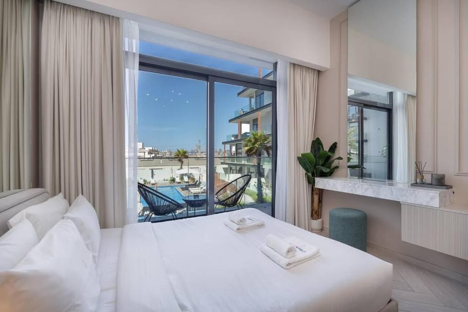 Beautiful Pool View JVC Cozy and Stylish Czechin Apartment in Dubai