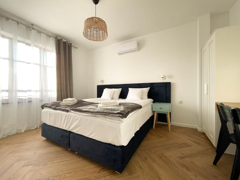 Bed, Photo of the whole room, Bedroom, towels, air conditioner