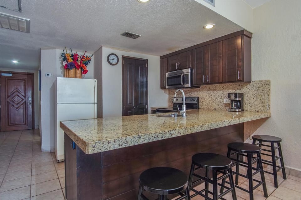 Kitchen or kitchenette, oven, stove