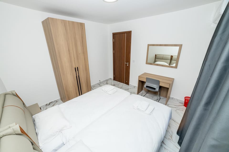 Modern 2-Bedroom Apartment with Terrace - by HostMT Apartment in Saint Paul's Bay