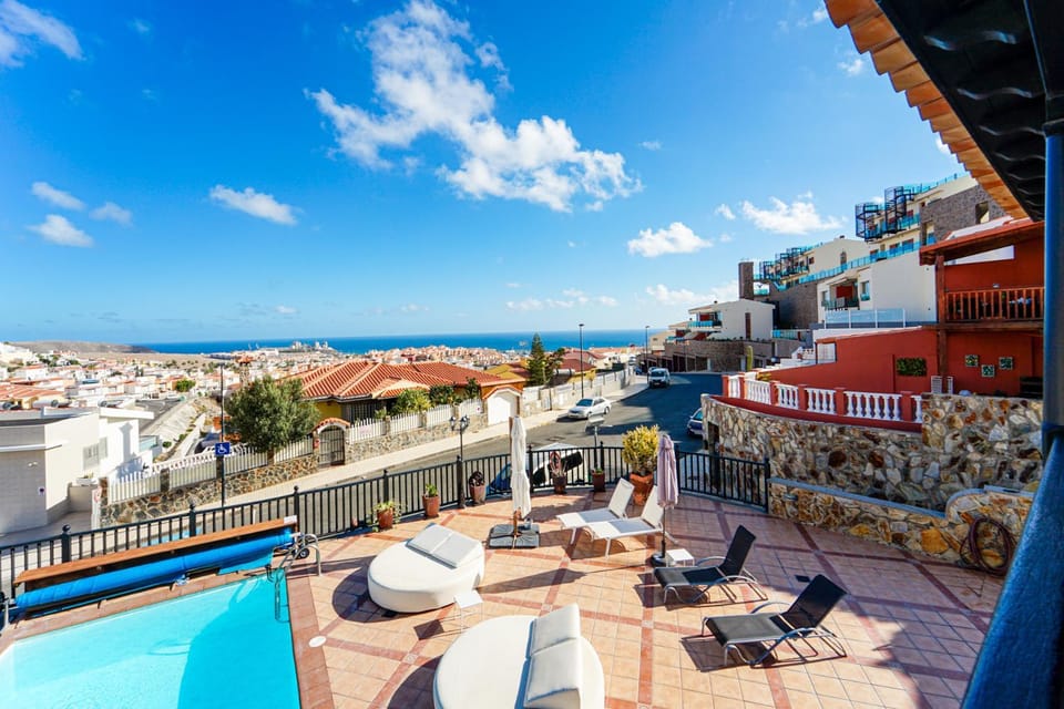 Property building, Patio, Day, Natural landscape, View (from property/room), Balcony/Terrace, Living room, Seating area, Pool view, Sea view, Swimming pool, Swimming pool