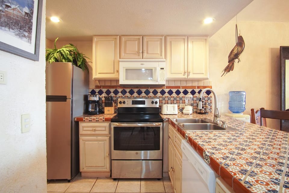 Kitchen or kitchenette, oven, stove