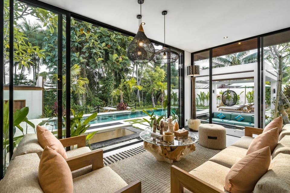 Living room, Seating area, Pool view
