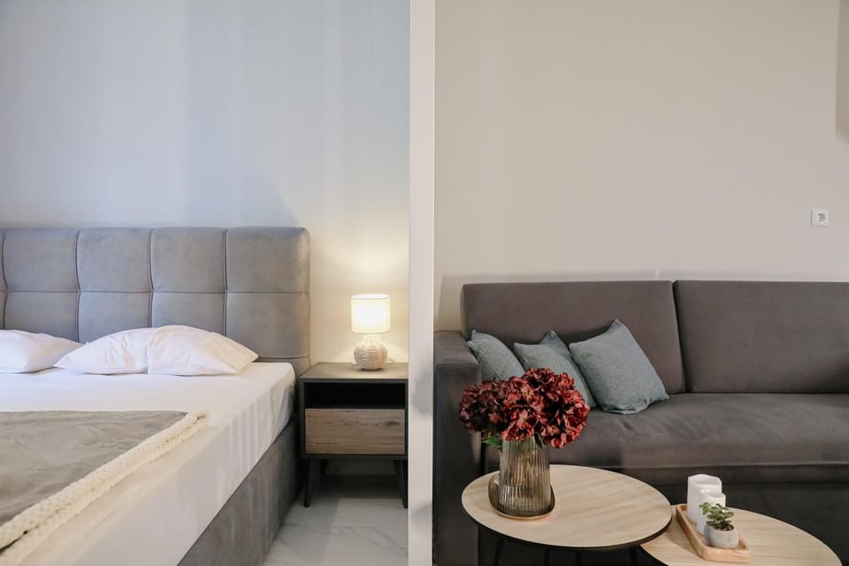 Bed, Living room, Seating area, Bedroom