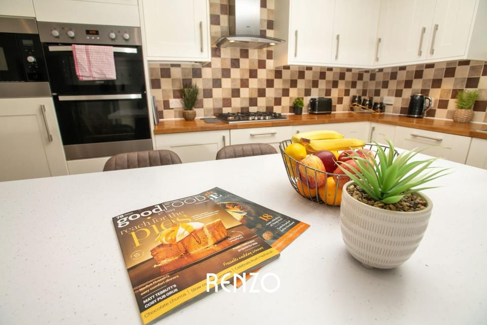 Kitchen or kitchenette, dishwasher, oven, stove
