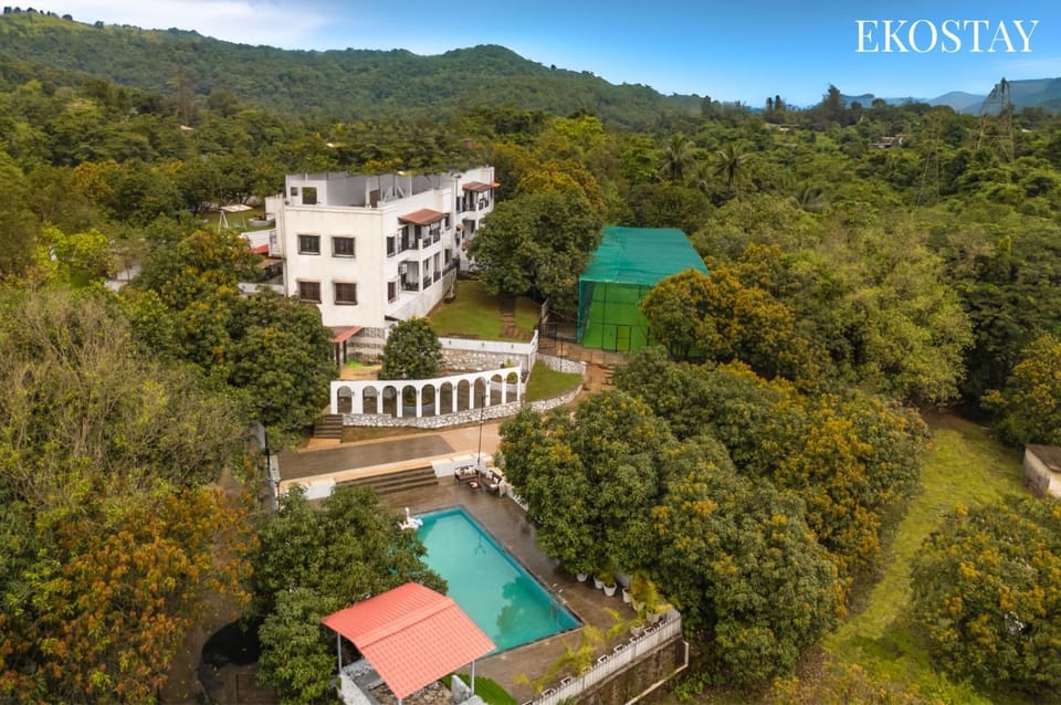 Property building, Nearby landmark, Spring, Day, Natural landscape, Bird's eye view, Mountain view, Pool view, Swimming pool