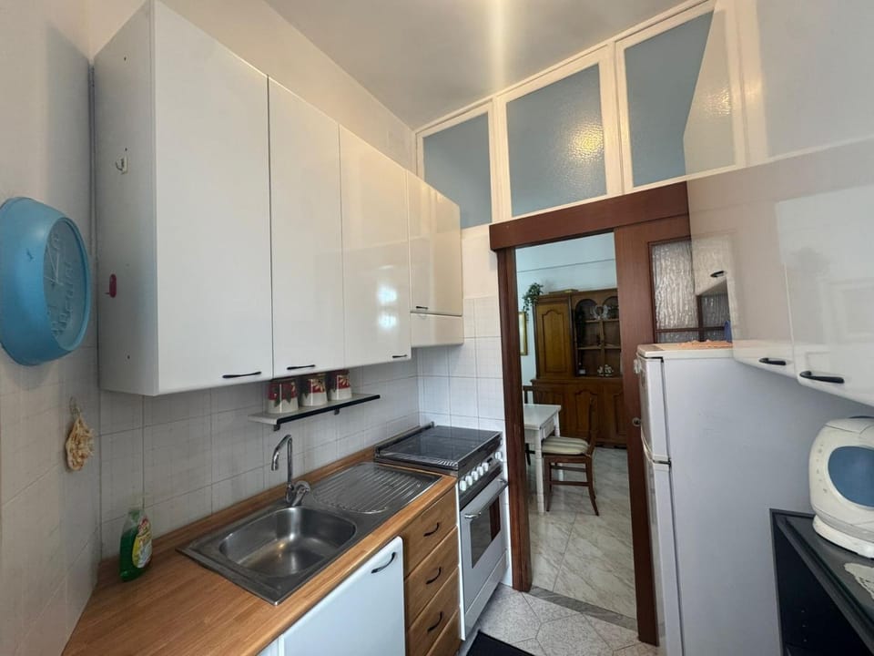 Kitchen or kitchenette, oven, stove