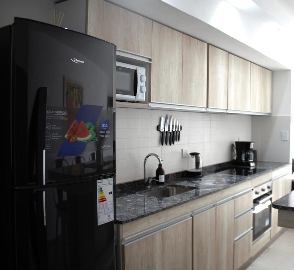 Kitchen or kitchenette, oven, stove