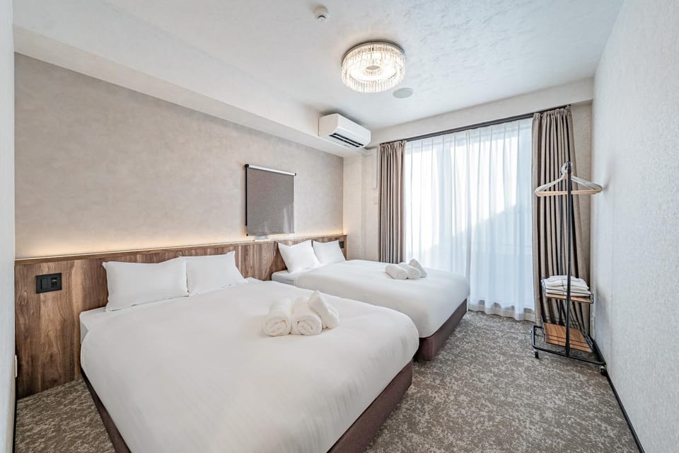 Bed, Photo of the whole room, Bedroom, towels, air conditioner
