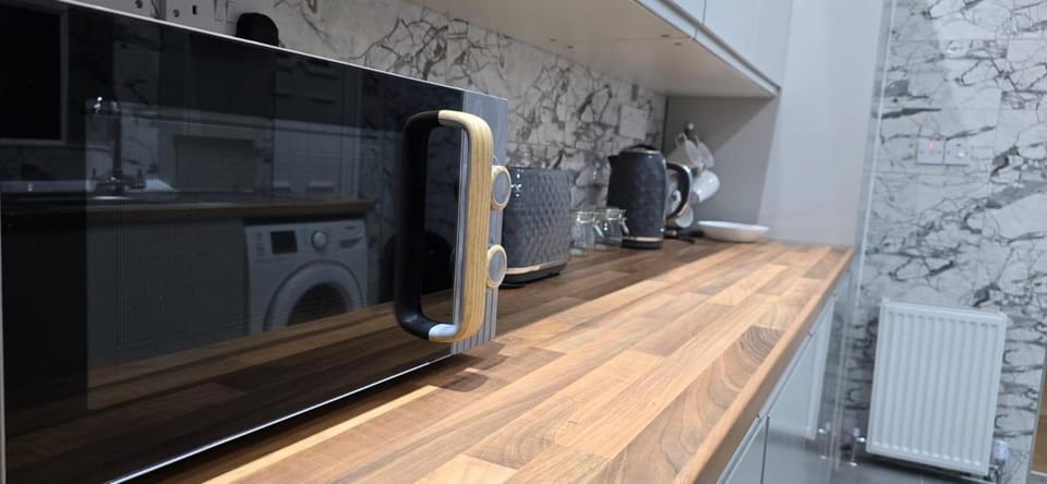 Kitchen or kitchenette, microwave