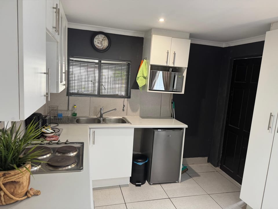 Kitchen or kitchenette, oven, stove